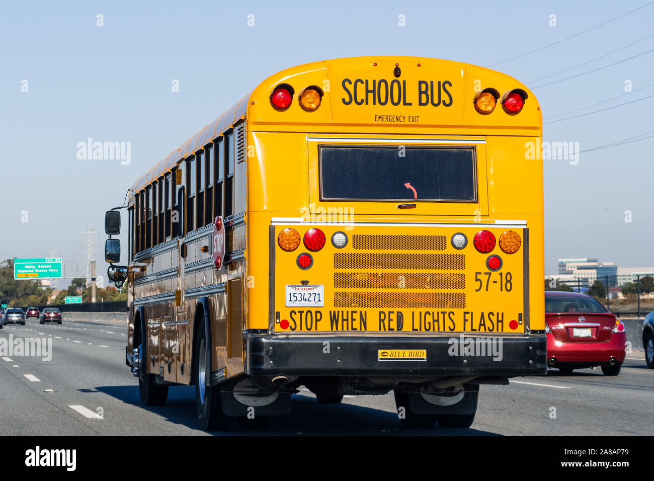 Nov 2, 2019 San Francisco / CA / USA - School Bus travelling on the highway Stock Photo