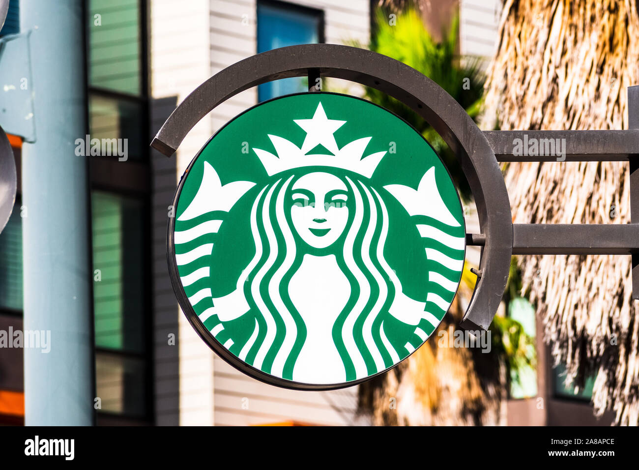 Nov 2, 2019 San Francisco / CA / USA - Starbucks logo at the entrance to a cafe located in Mission Bay District Stock Photo