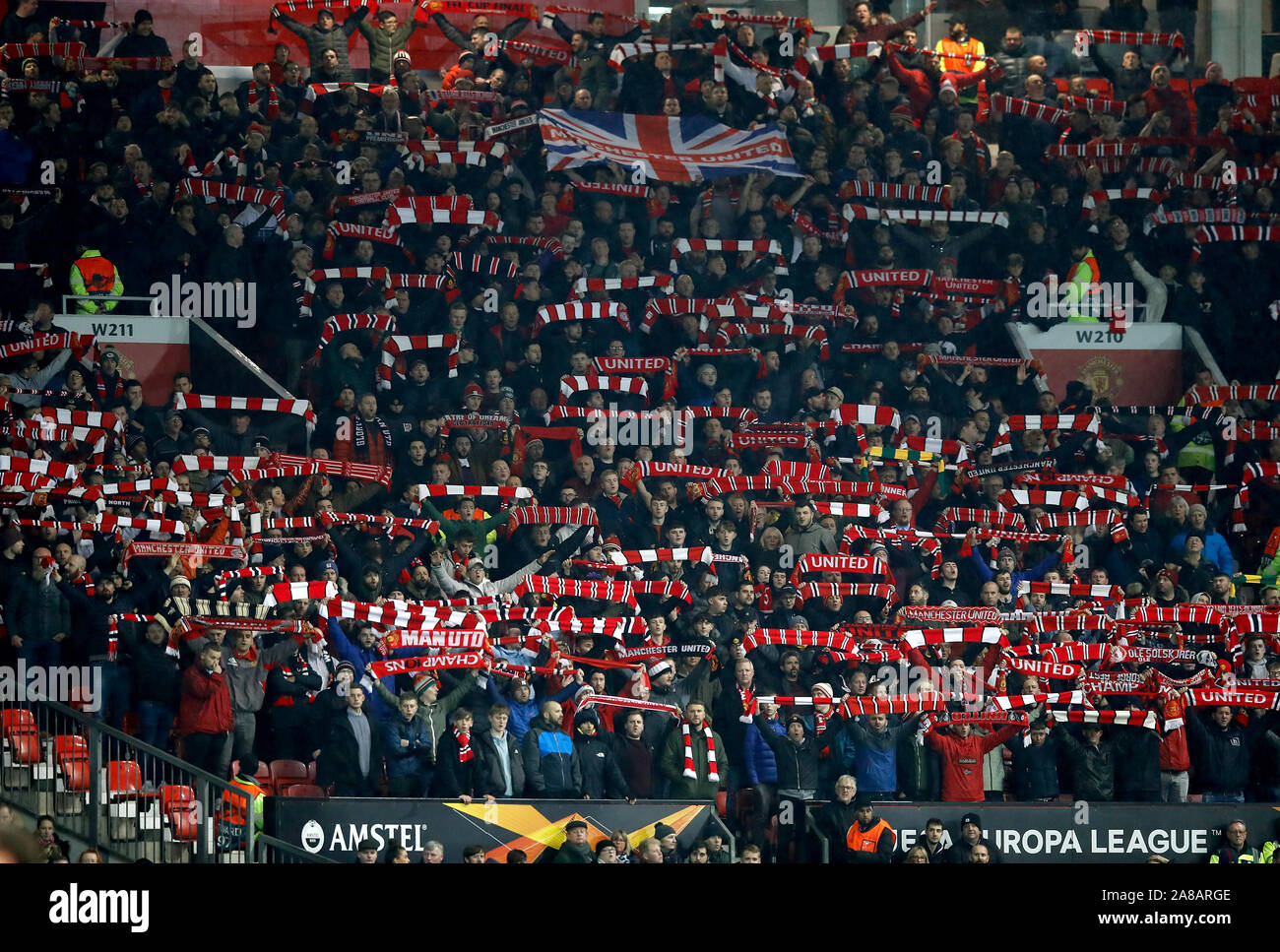 Manchester United fans in the stands during the UEFA Europa League Group L match at Old Trafford, Manchester. Stock Photo