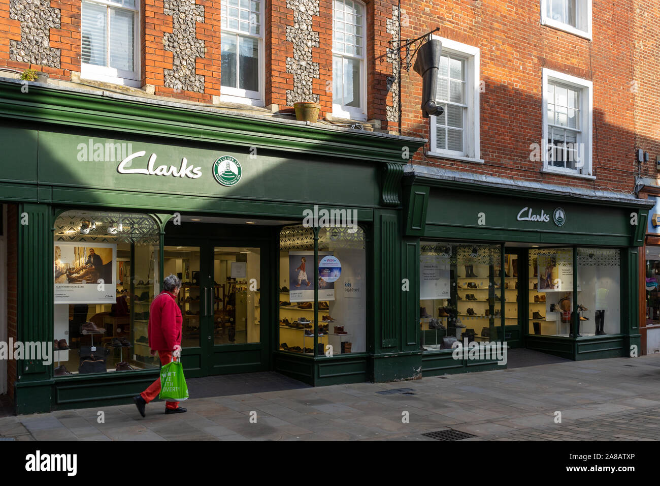 The exterior of a Clarks shoe shop or shoe store on the high street in  Winchester UK Stock Photo - Alamy