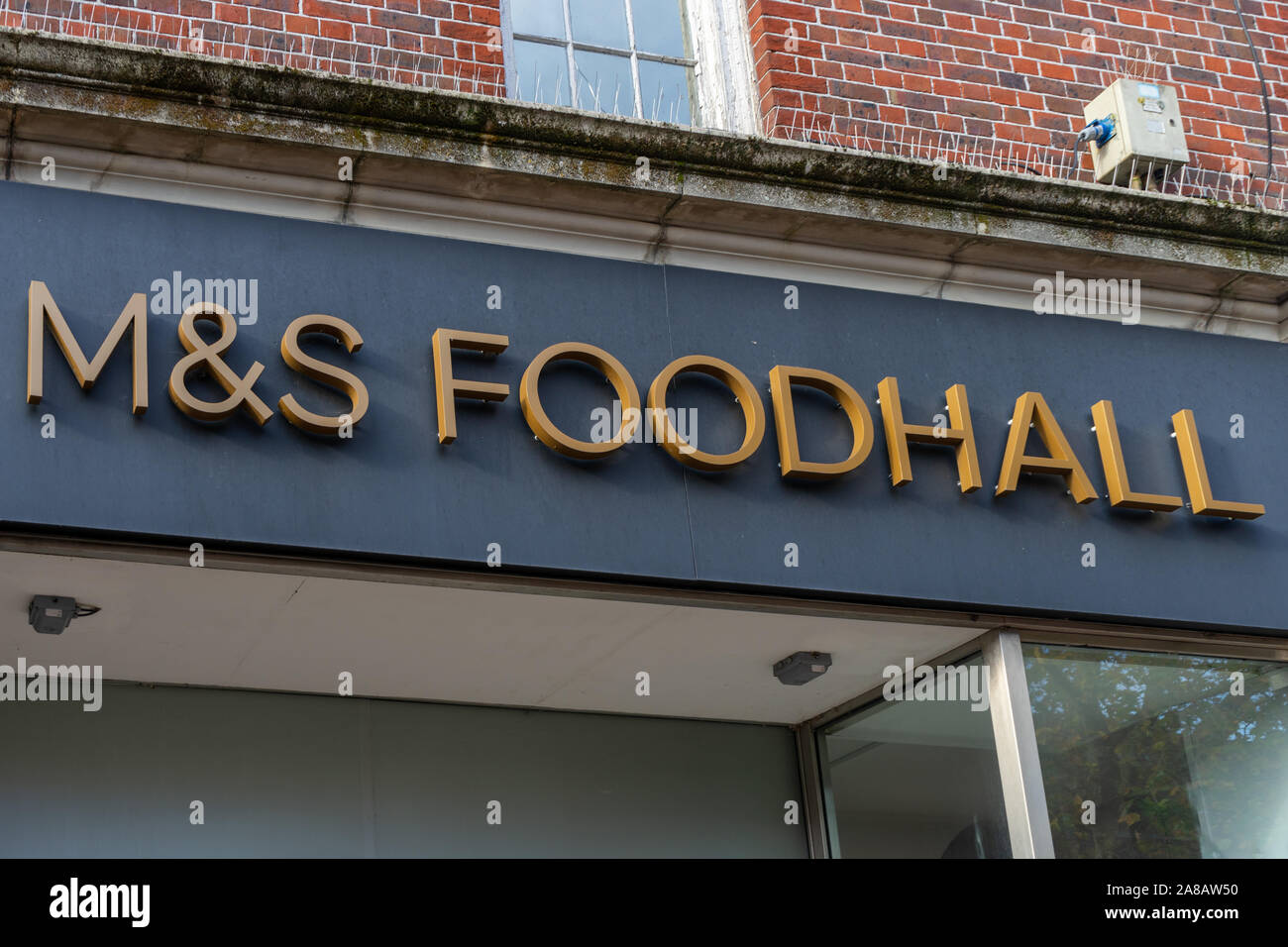 the sign of a M&S Foodhall or marks and spencer foodhall shop store or shop Stock Photo