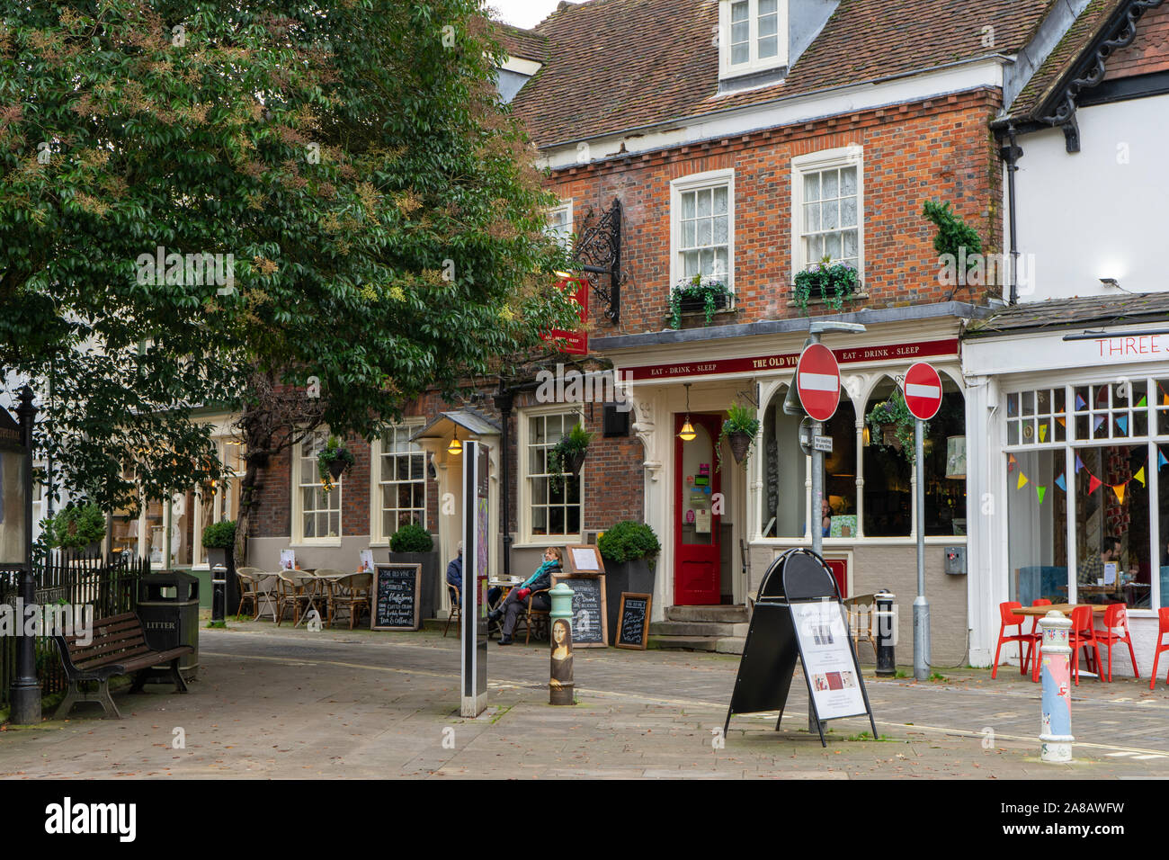 An old english pub in a historic city a typical english street, Winchester, UK Stock Photo