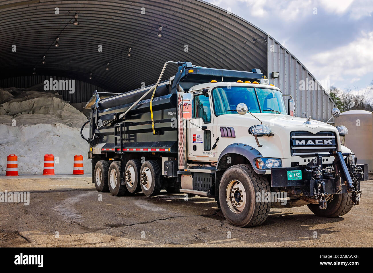 A Mack Granite truck waits to be loaded with salt at the Tennessee Department of Transportation’s salt barns, March 13, 2018, in Knoxville, Tennessee. Stock Photo