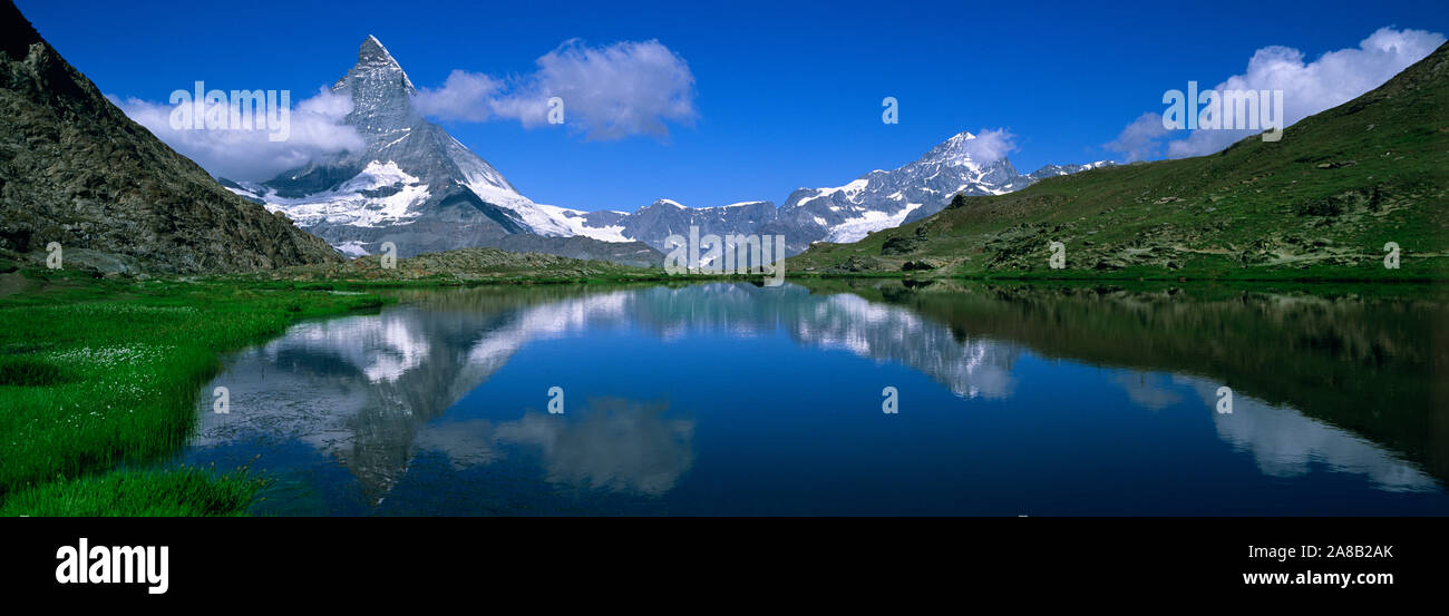 Reflection of mountains in water, Riffelsee, Matterhorn, Switzerland Stock Photo