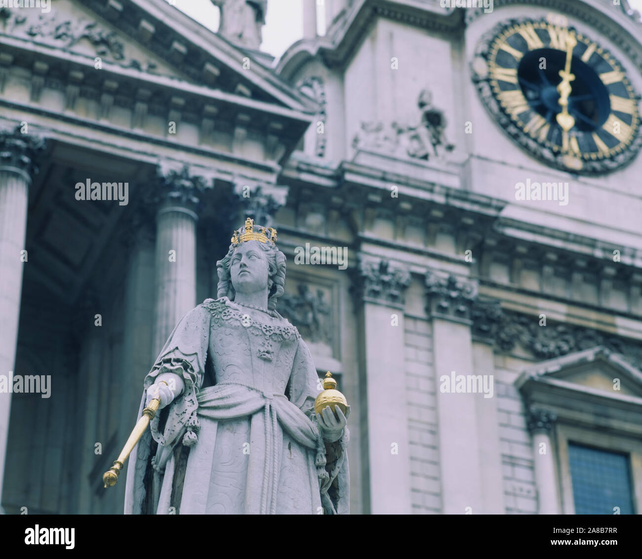 Low angle view of a statue in front of a cathedral, St. Paul's Cathedral, London, England Stock Photo