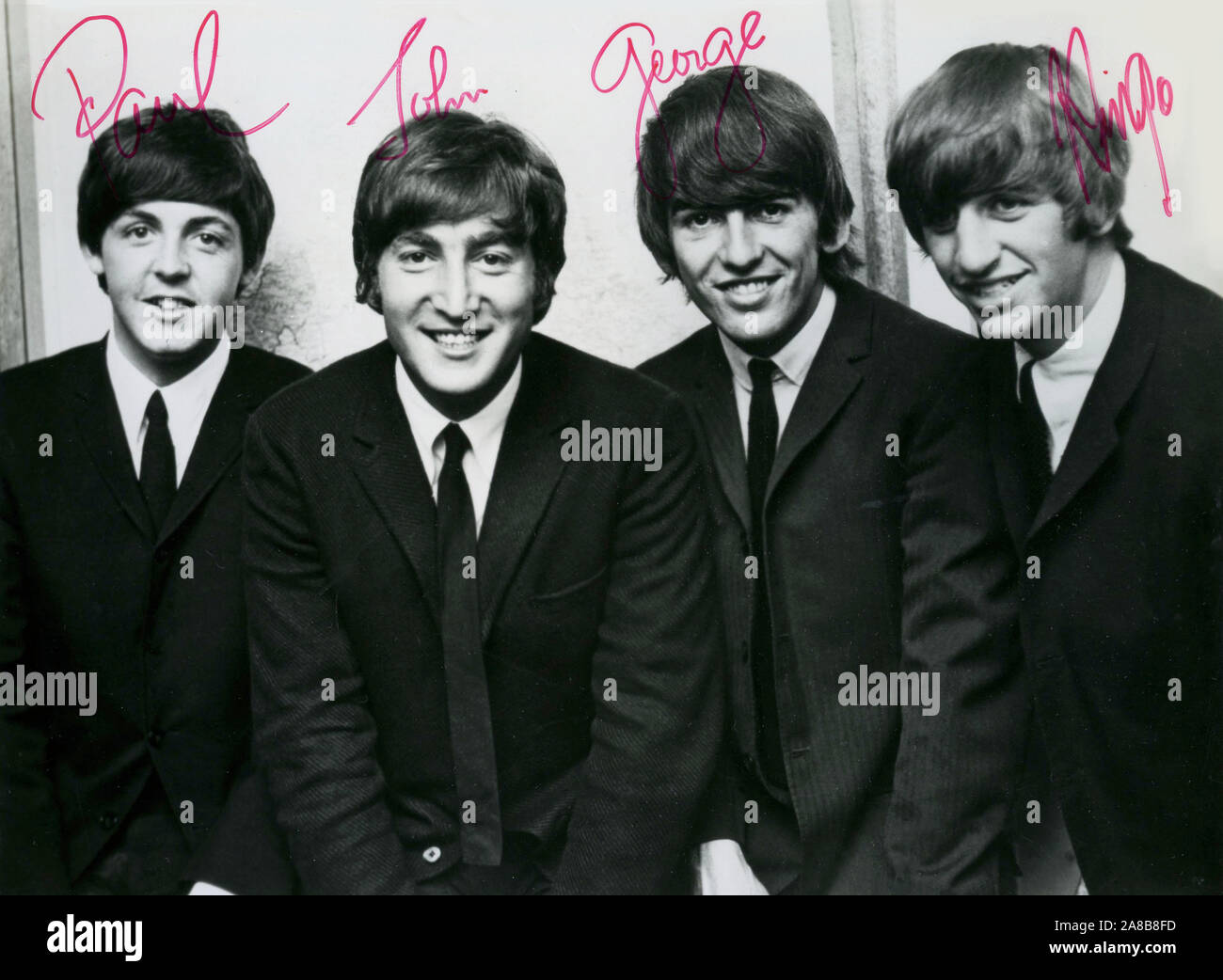Early 1960s publicity photo of the Beatles from Capitol Records with autographs. Stock Photo