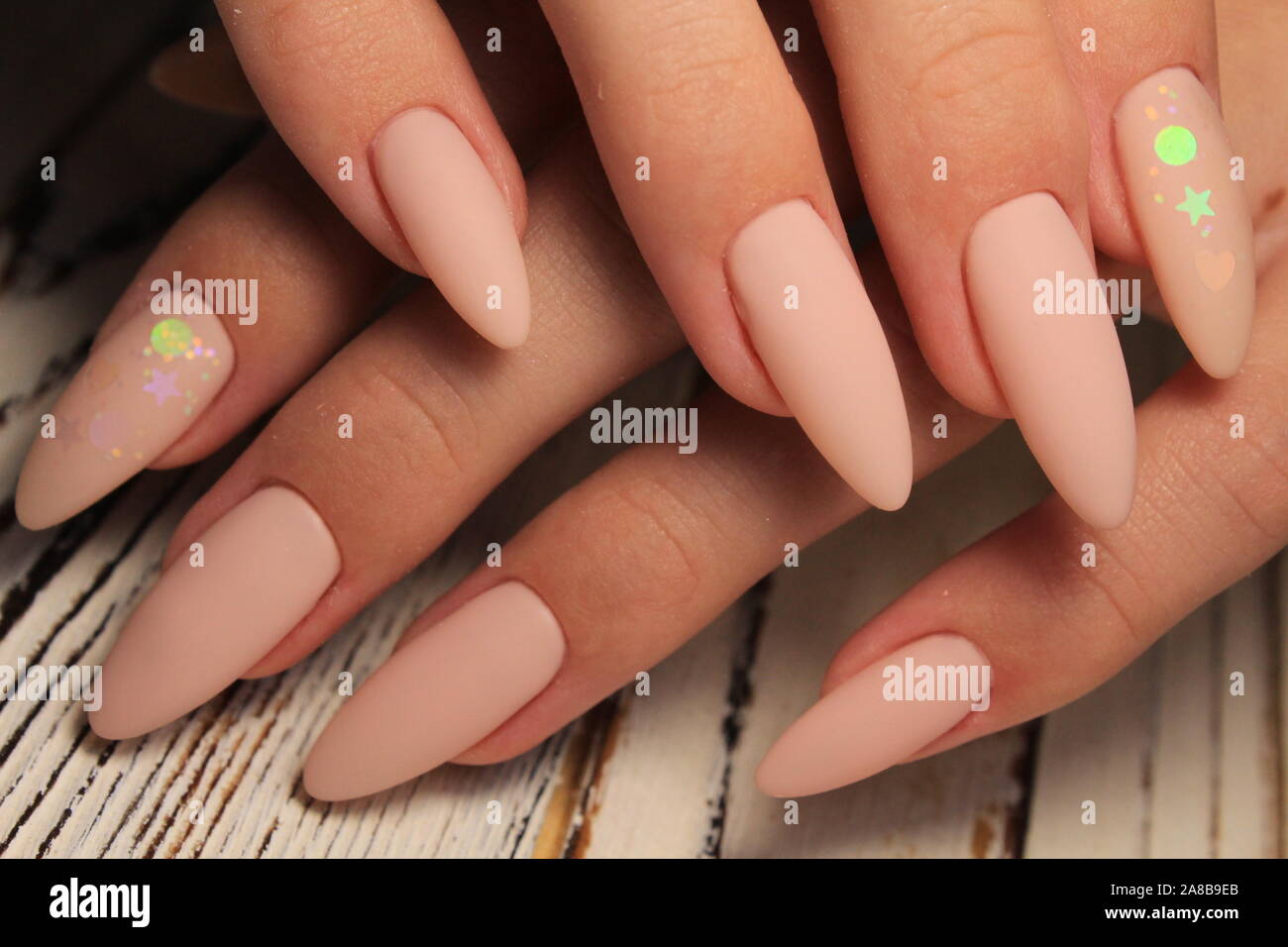 sexy manicure on long beautiful nails Stock Photo - Alamy