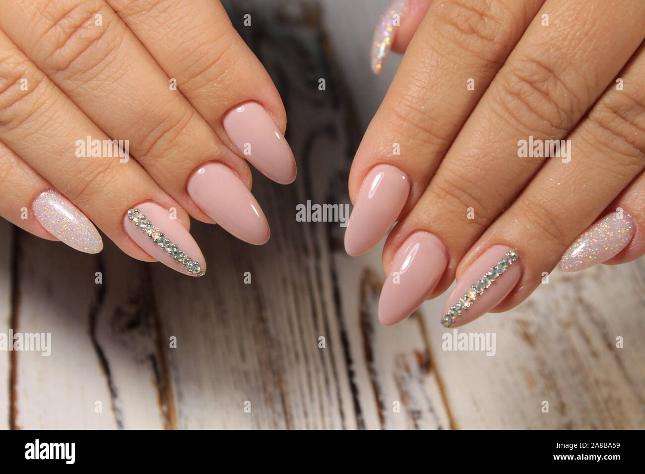 sexy manicure on long beautiful nails Stock Photo - Alamy