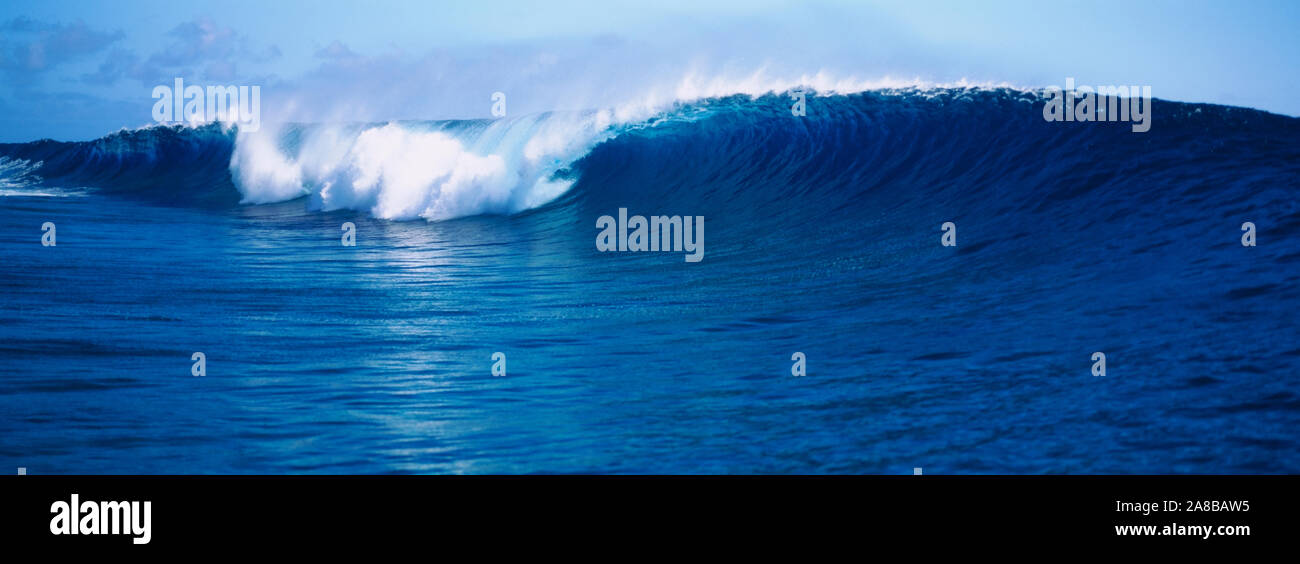 Waves breaking on the coast, Tahiti, French Polynesia Stock Photo