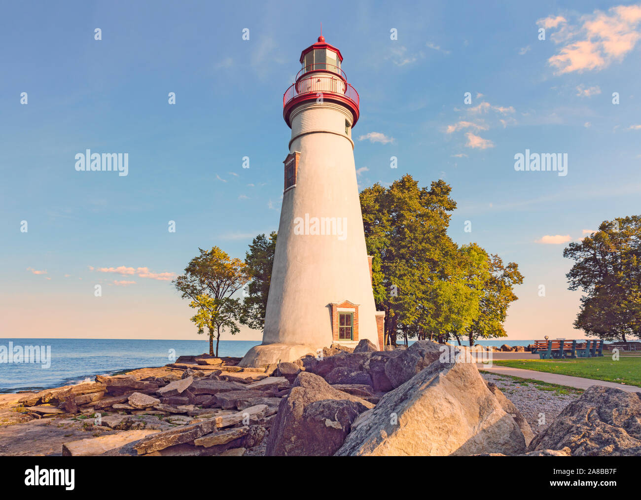 Dramatic autumn scenic Marblehead Peninsula and Lighthouse on rocky shore of Lake Erie, American Great Lakes Marblehead Lighthouse State Park Ohio Stock Photo