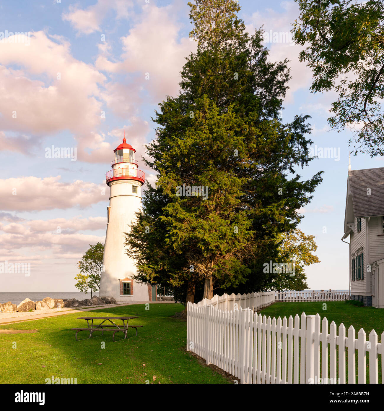 Beautiful twilight view of Marblehead Lighthouse and keeper's house on Lake Erie. Ohio landmark places to see travel and tourism scenic Stock Photo
