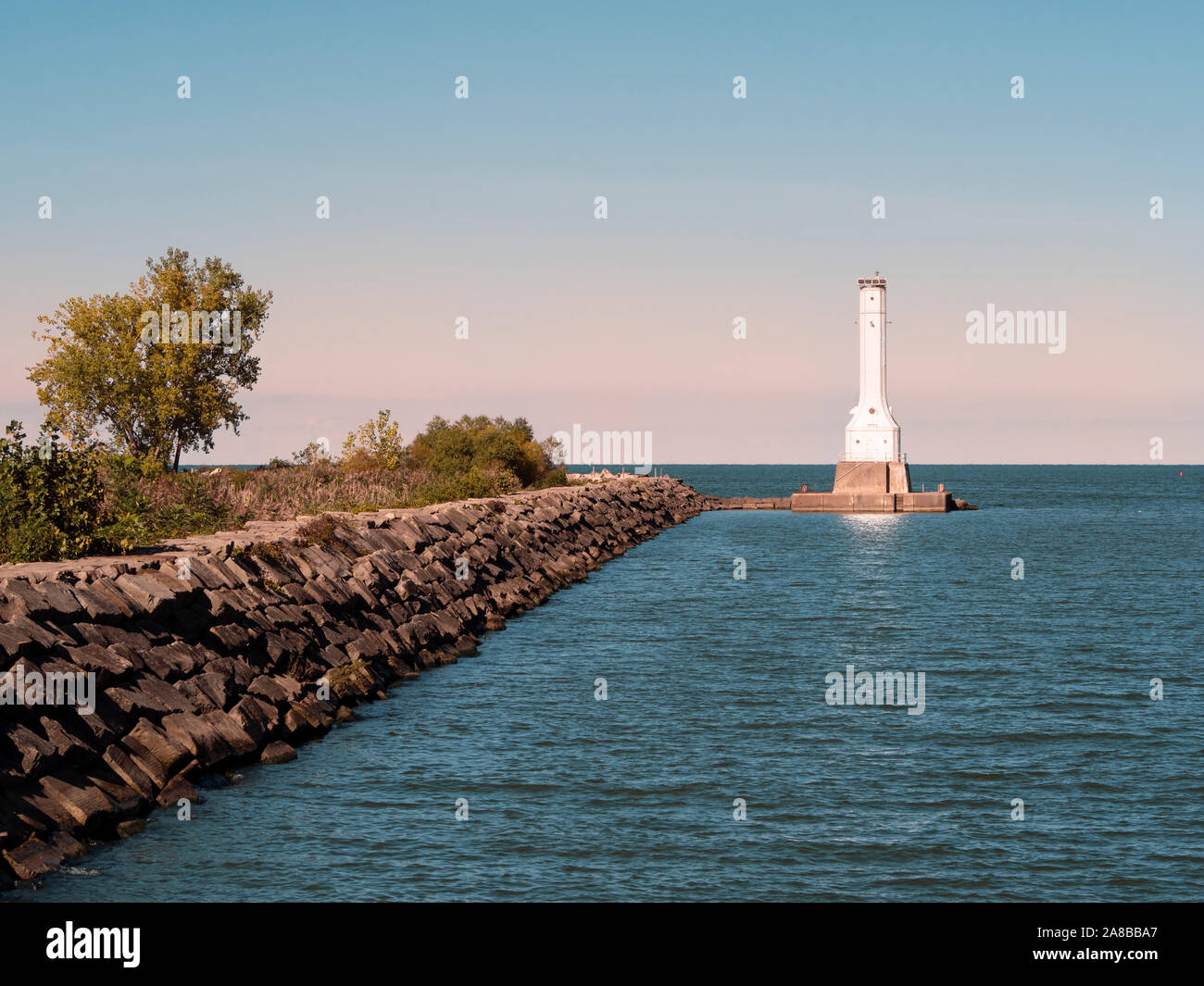Huron Harbor Lighthouse on Lake Erie, blue hour before sunset, built 1939, solar power powered lantern beacon added 1972 still active Stock Photo