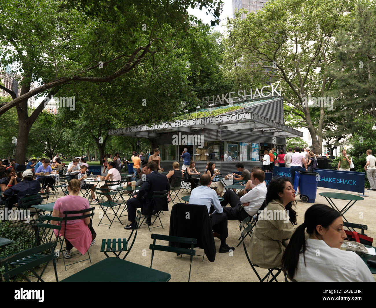 Group of people sitting in a restaurant, Shake Shack, Madison Square, intersection of 24th street and Madison Avenue, Manhattan, New York City, New York State, USA Stock Photo