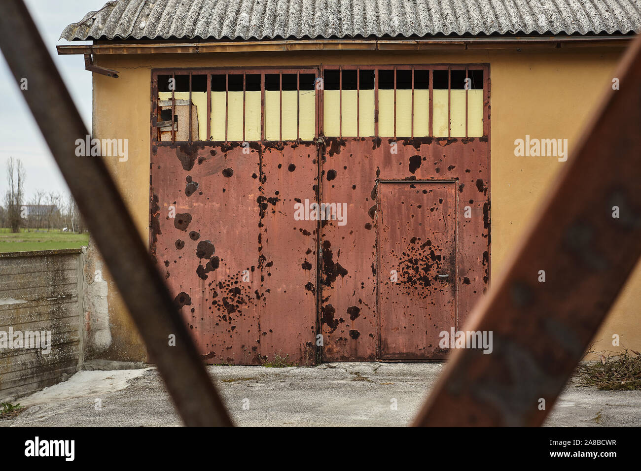 Door in rusty iron and corroded by time Stock Photo