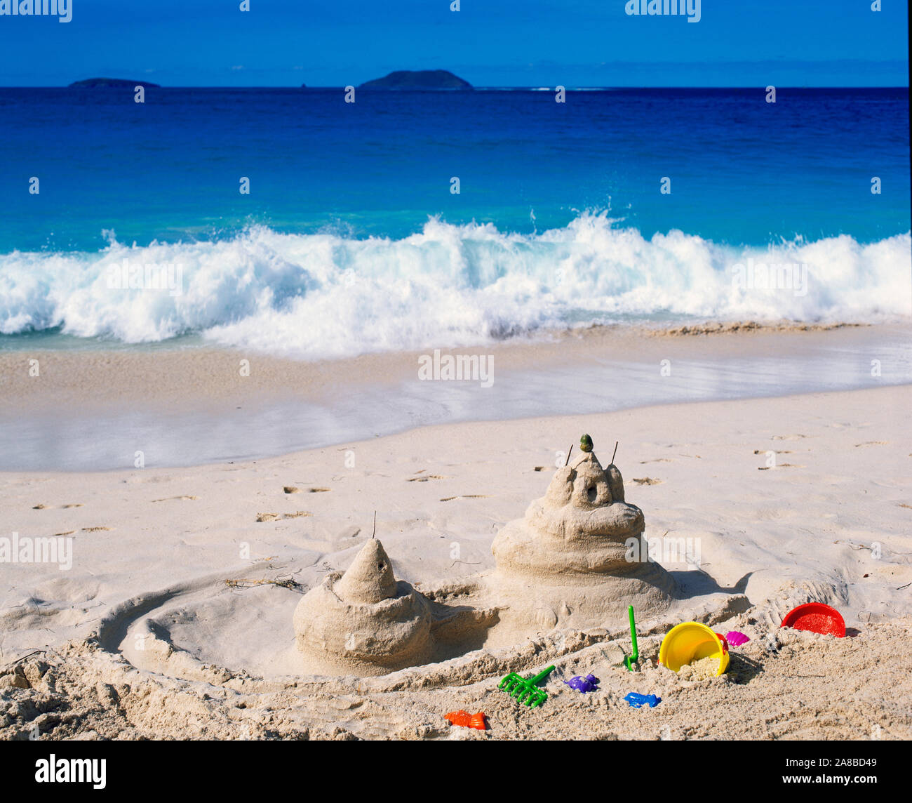 Sand castles on beach with sea in background, Saint John, US Virgin Islands Stock Photo