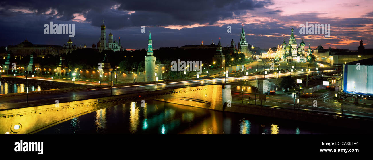 Buildings in a city lit up at night, Red Square, Moskva River, Moscow, Russia Stock Photo