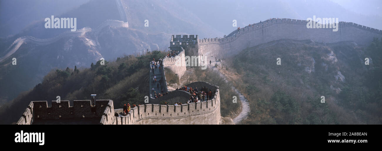 Aerial view of tourists walking on a wall, Great Wall Of China, Beijing, China Stock Photo