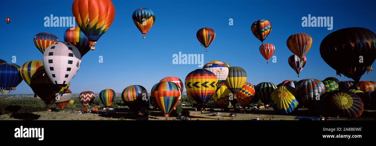 Hot air balloons floating in sky, Albuquerque International Balloon Fiesta, Albuquerque, Bernalillo County, New Mexico, USA Stock Photo