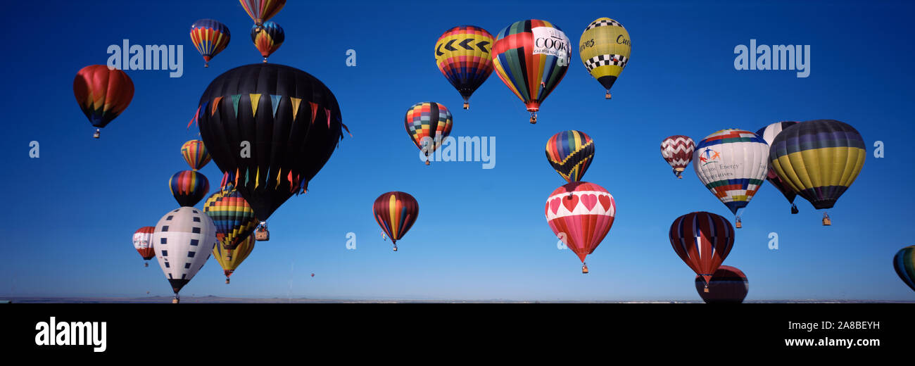 Hot air balloons floating in sky, Albuquerque International Balloon Fiesta, Albuquerque, Bernalillo County, New Mexico, USA Stock Photo
