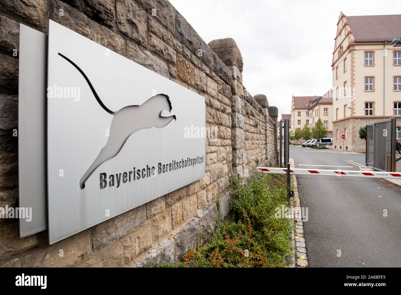 16 October 2019, Bavaria, Würzburg: A sign with the inscription 'Bayerische Bereitschaftspolizei' (Bavarian Riot Police) is placed in front of the entrance to the Mainau barracks, the seat of the riot police III. department Würzburg. Photo: Daniel Karmann/dpa Stock Photo