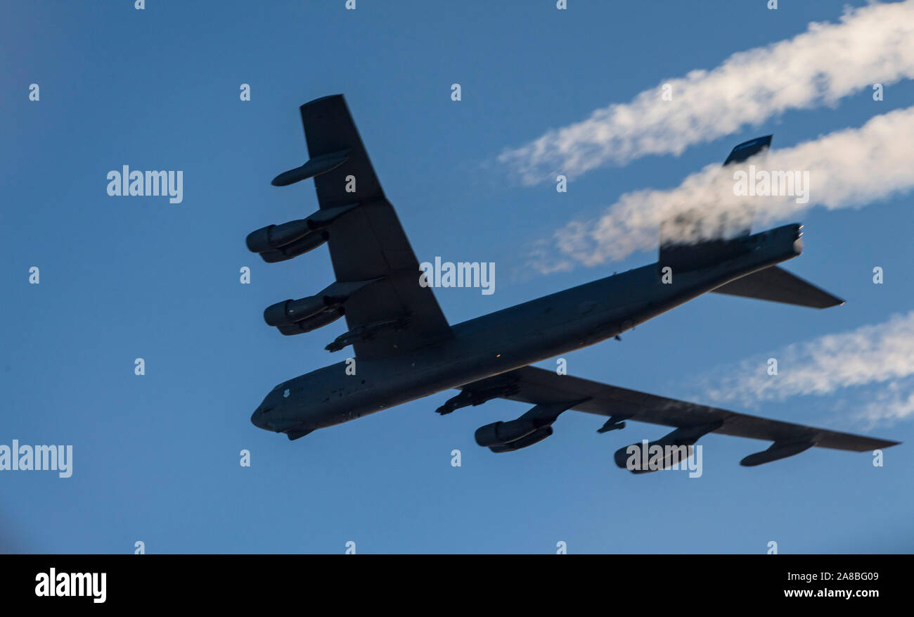 A U.S. Air Force B-52H Stratofortress strategic bomber soars across the Norwegian sky during training with the Norwegian Air Force November 6, 2019 over the Barents Sea, Norway. Stock Photo