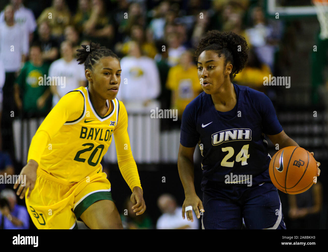 Waco, Texas, USA. 5th Nov, 2019. Baylor Lady Bears guard Juicy Landrum (20) defends New Hampshire Wildcats guard Helena Delaruelle (24) during the 1st half of the NCAA Women's Basketball game between New Hampshire Wildcats and the Baylor Bears at The Ferrell Center in Waco, Texas. Matthew Lynch/CSM/Alamy Live News Stock Photo