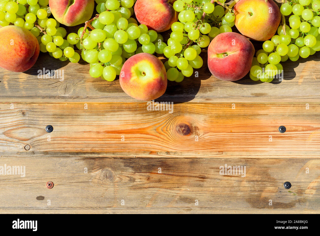 First fruits habikkurim in hebrew and white cheese on wooden table