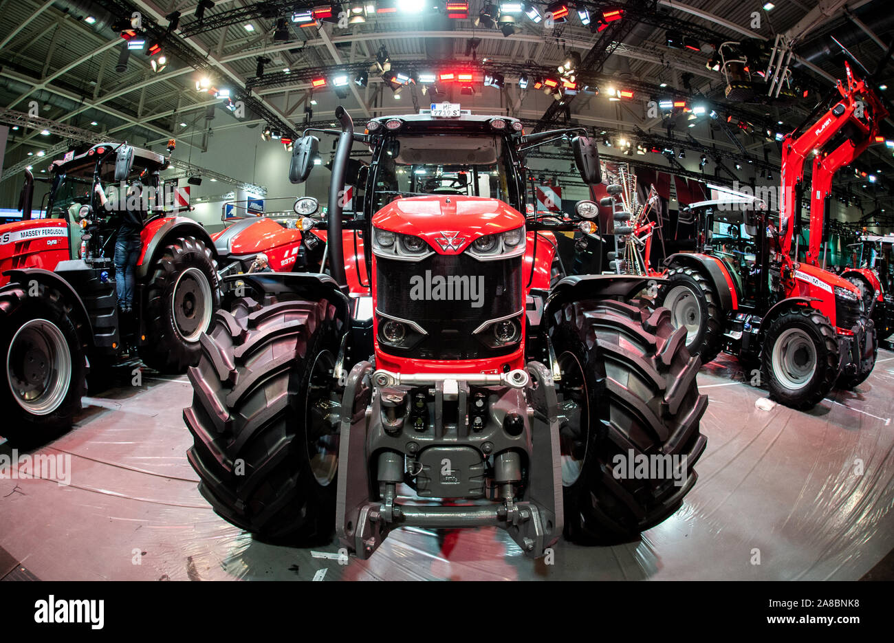 Hanover, Germany. 07th Nov, 2019. Several tractors are standing at Massey  Ferguson's stand at the Agritechnica agricultural machinery fair in Hanover  (photo with fisheye lens). Around 2,800 exhibitors will be presenting their