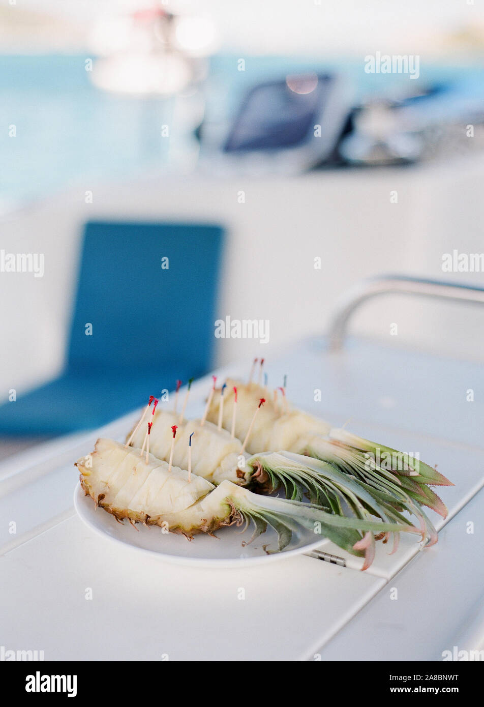 Pineapple sitting on the deck of a sailboat ready for service, British