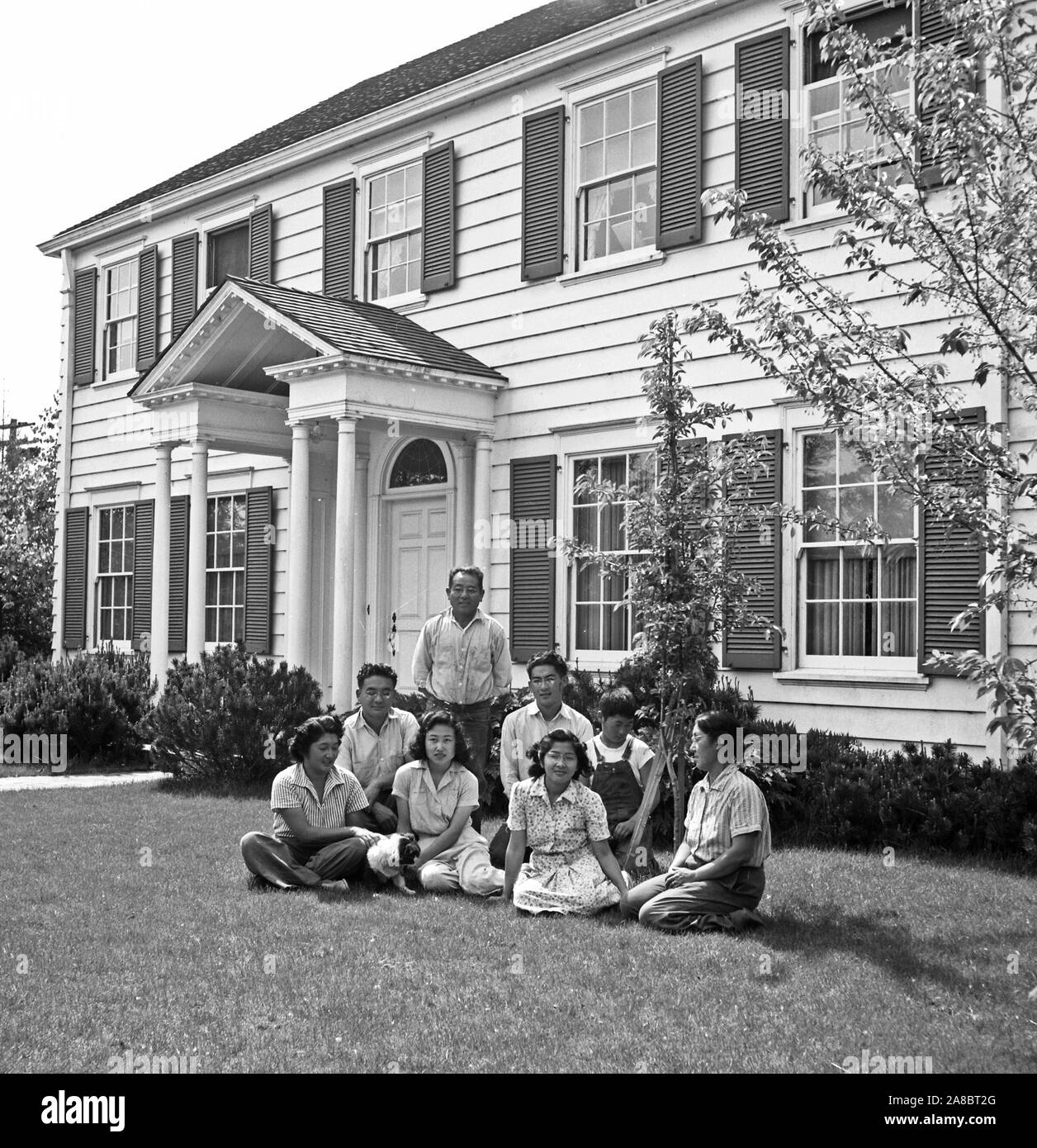 Mountain View, Caifornia. The Shibuya family on the lawn in front of their beautiful home before evacuation to War Relocation Authority centers where residents of Japanese ancestry are to be relocated 4/18/1942 Stock Photo