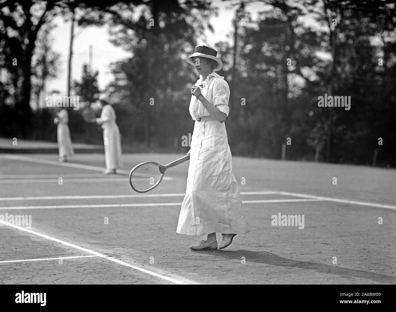 Woman playing tennis at a tournament in 1913 Stock Photo Alamy