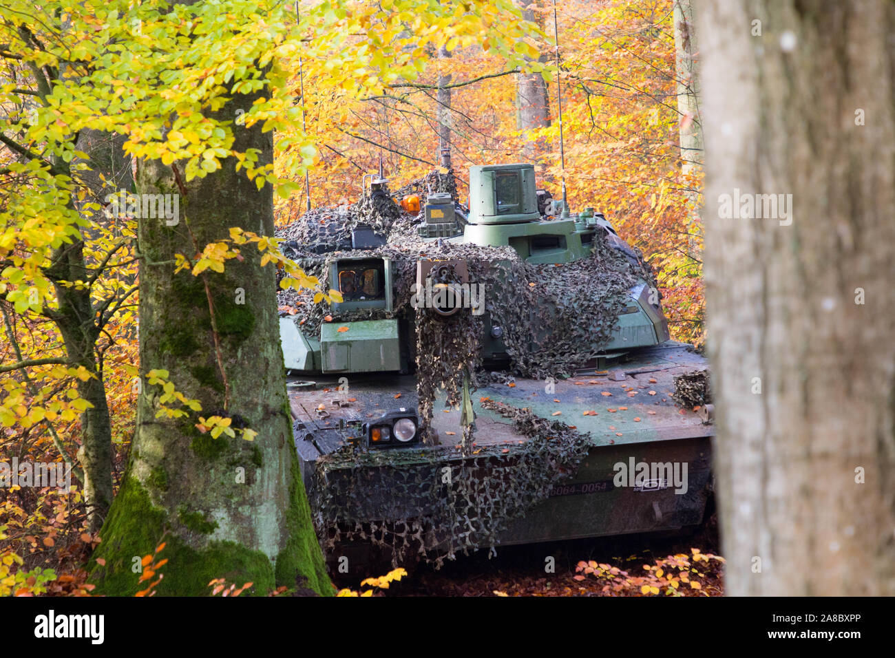 A French Leclerc tank belonging to the 501st Combat Tank Regiment waits stationary for enemy arrival at the role-playing town of Kittensee during Dragoon Ready 20 at the Joint Multinational Readiness Center, Hohenfels, Germany, Nov. 6, 2019. DR20 is a 7th Army Training Command led exercise designed to ensure readiness and certify the 2d Cavalry Regiment in NATO combat readiness and unified land operations. (U.S. Army photo by Pfc. Michael Ybarra) Stock Photo