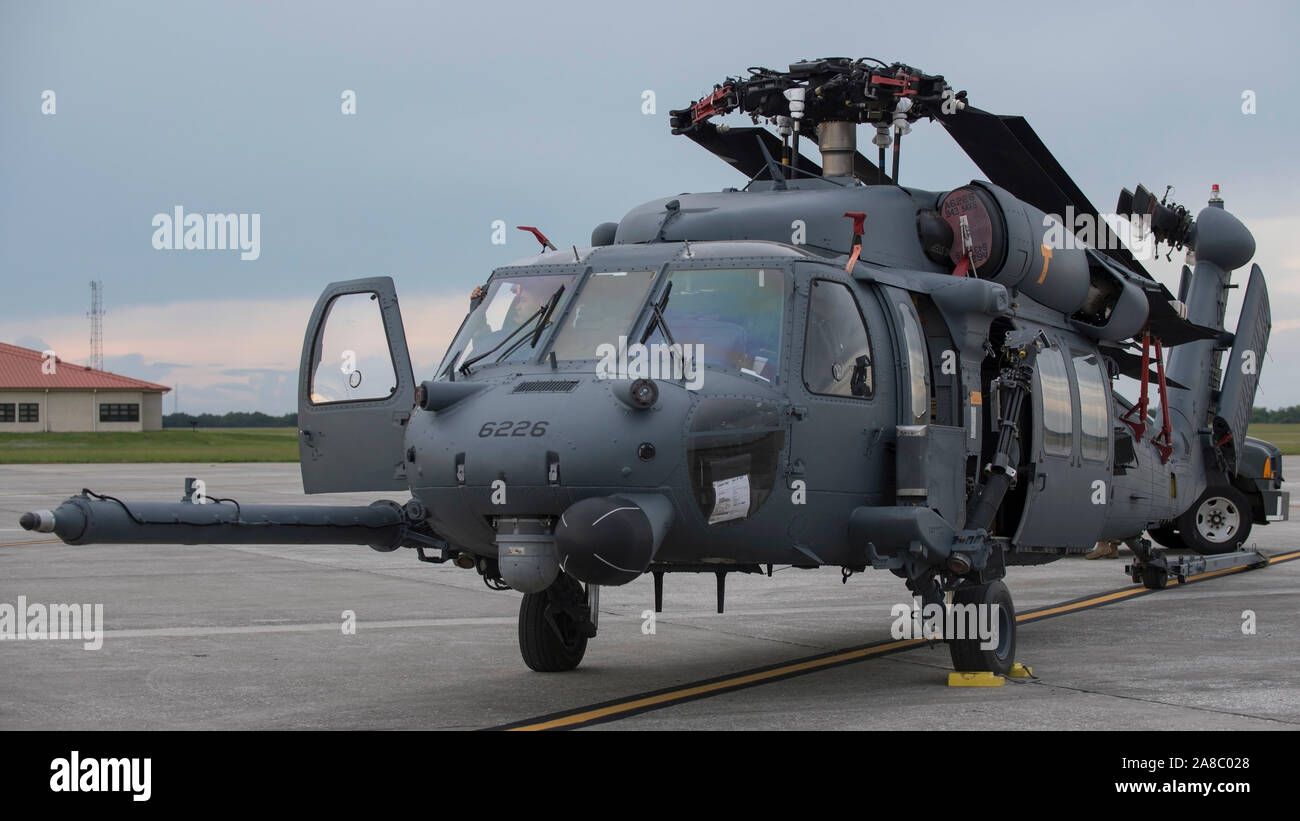 An HH-60 Pave Hawk helicopter assigned to the 305th Rescue Squadron (RQS), Davis-Monthan Air Force Base, Ariz., sits on the flightline at MacDill Air Force Base, Fla., Nov. 5, 2019. MacDill is hosting the 305th RS while they participate in a readiness exercise. (U.S. Air Force photo by Airman 1st Class Ryan C. Grossklag) Stock Photo