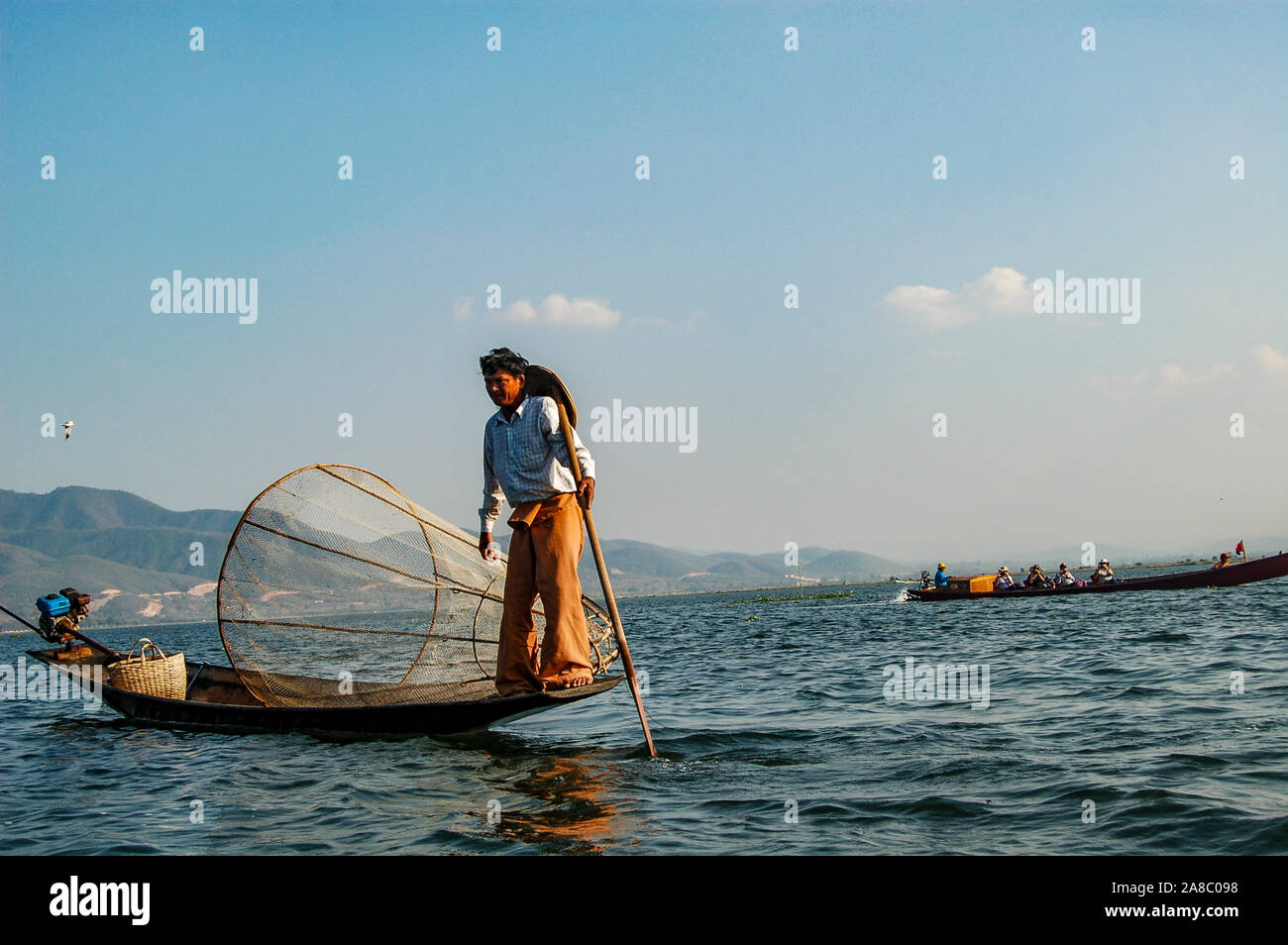 Traditional Myanmar Inle Lake fishing technique Stock Photo ...