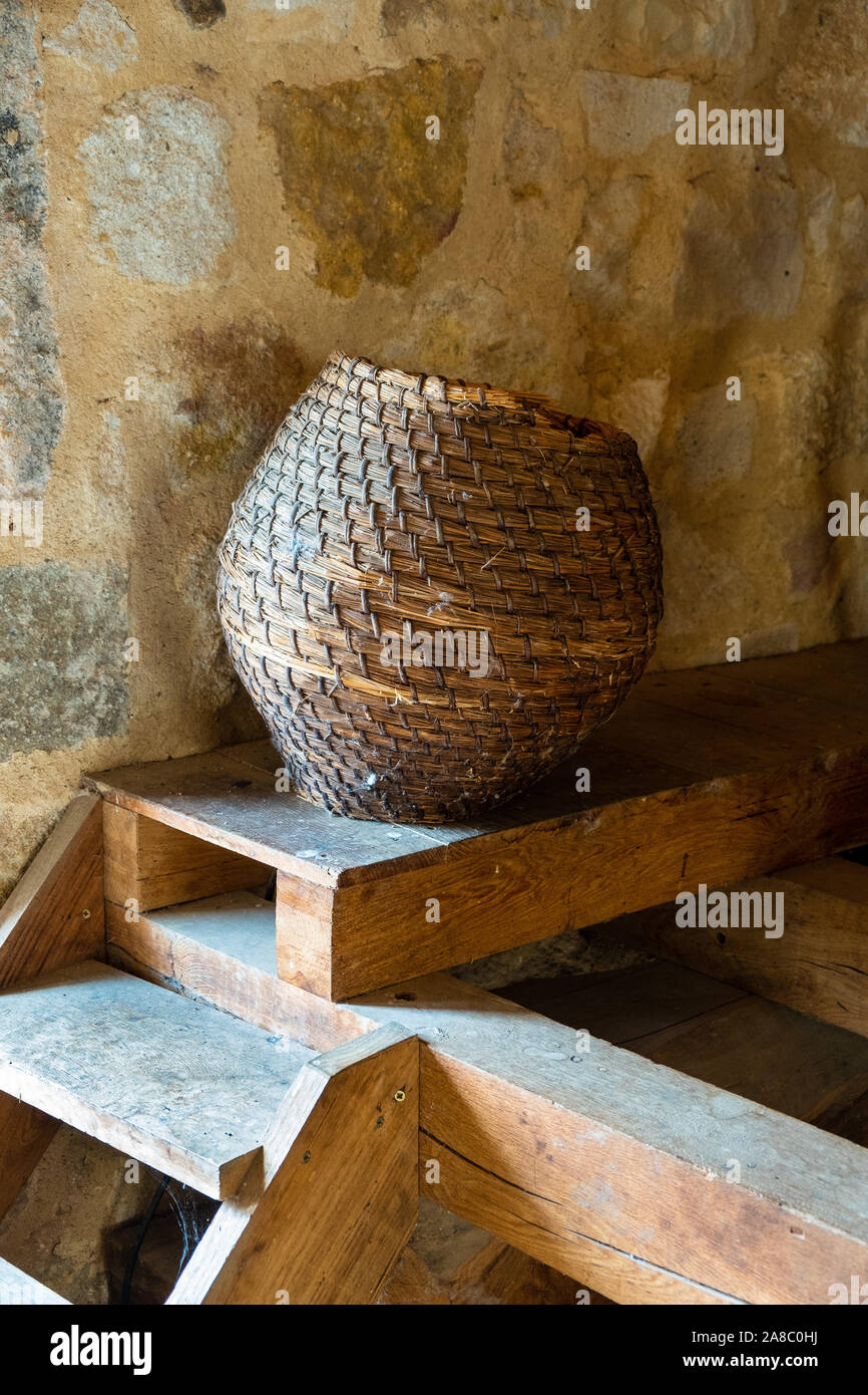 old basket in the loft of a farm Stock Photo