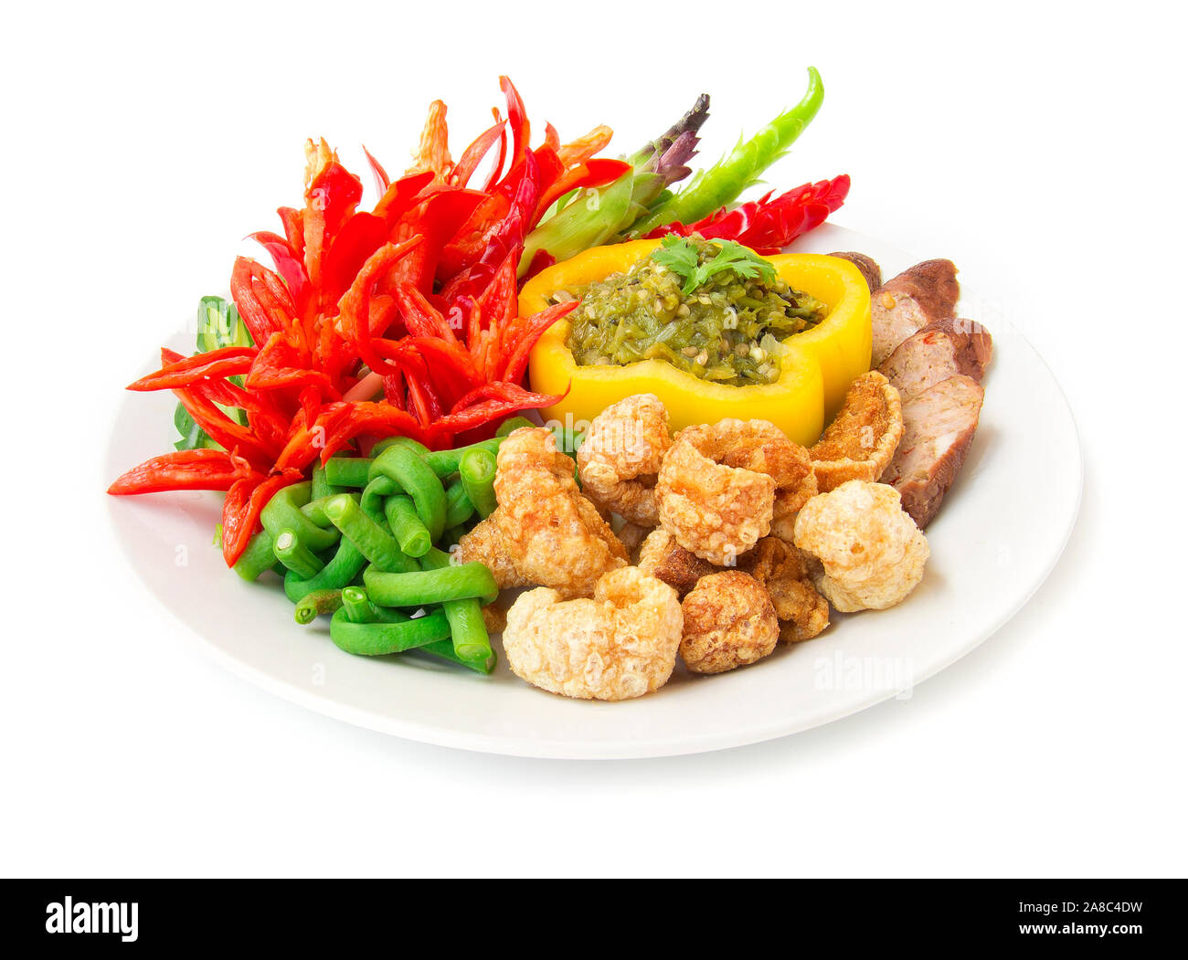 Thai spicy Chili green paste dipping sauce with fresh carving vagetable