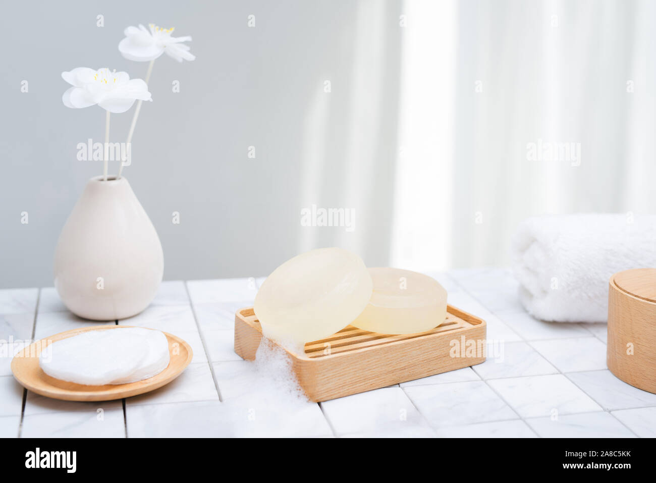 Natural soap and cotton bath for spa treatment. Beauty concept. Stock Photo