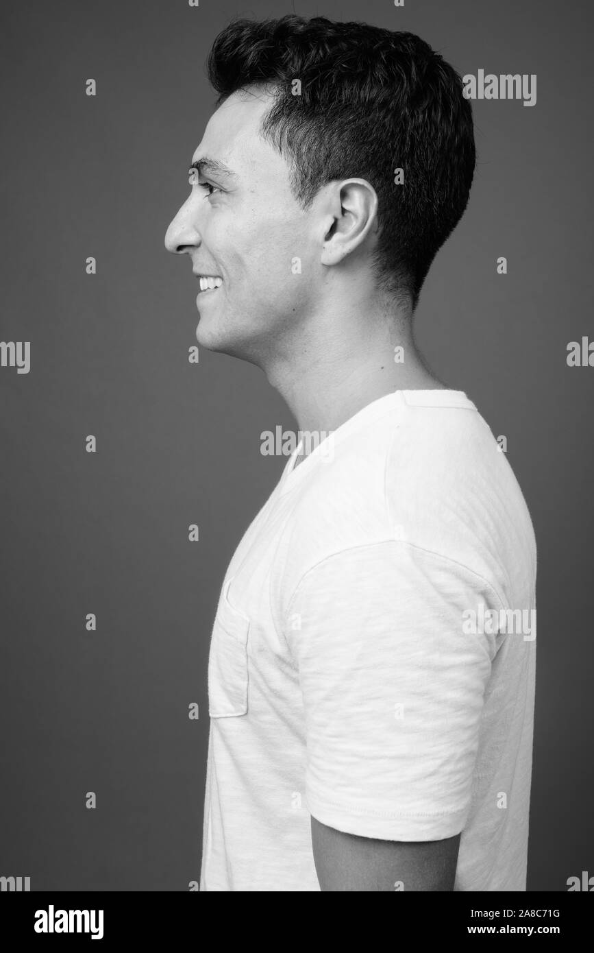 Happy latin person side view Black and White Stock Photos & Images - Alamy
