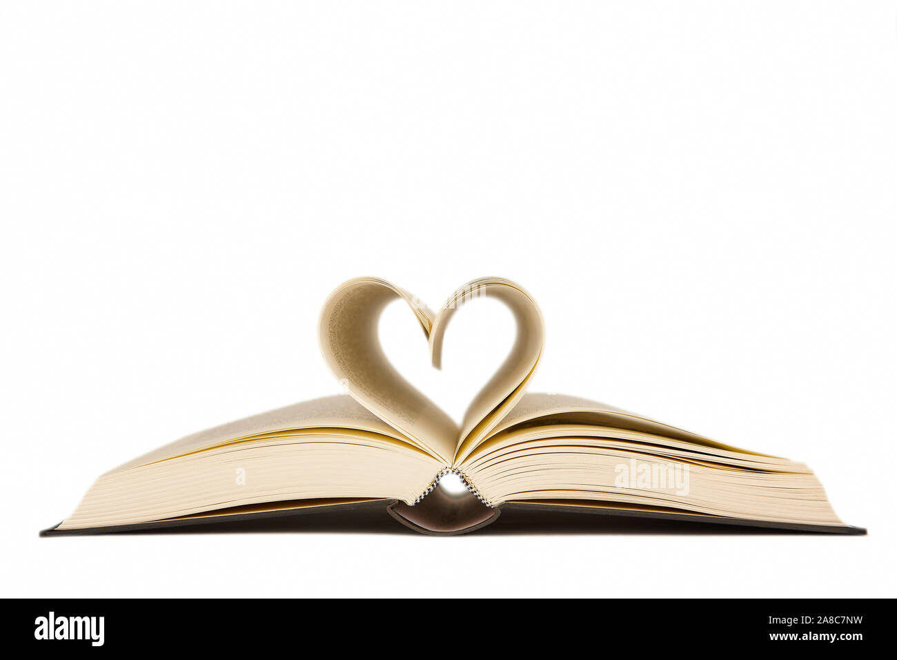 Open book with heart shaped pages. Love for reading. Isolated Stock