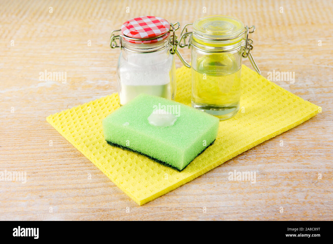 Side view of nature and eco friendly natural cleaner baking soda and olive oil paste on washing sponge for cleaning home, removing stains, non toxic c Stock Photo