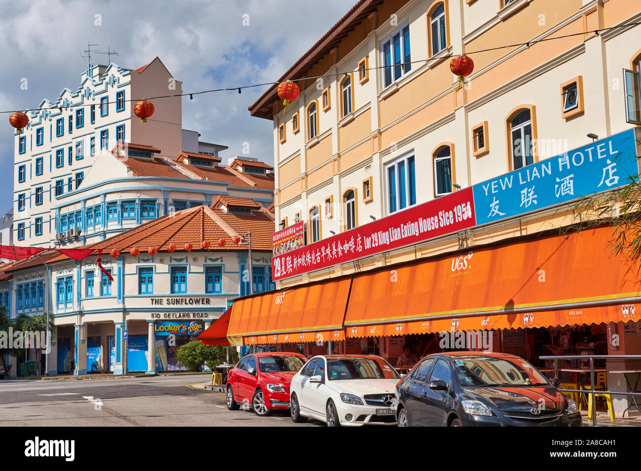 View from Lorong 29, Geylang, Singapore, towards The Sunflower complex and Geylang Road Stock Photo