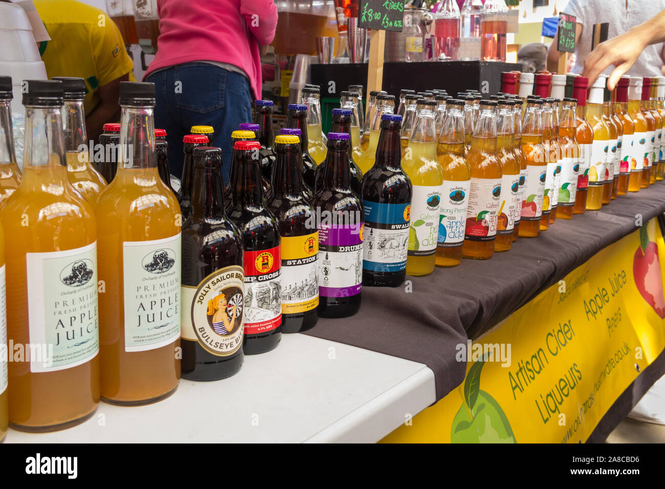 Artisan beer, cider and pressed apple juices on sale at the stall of Orchards of Hustwaite at the Bolton Food Festival 2017. Stock Photo