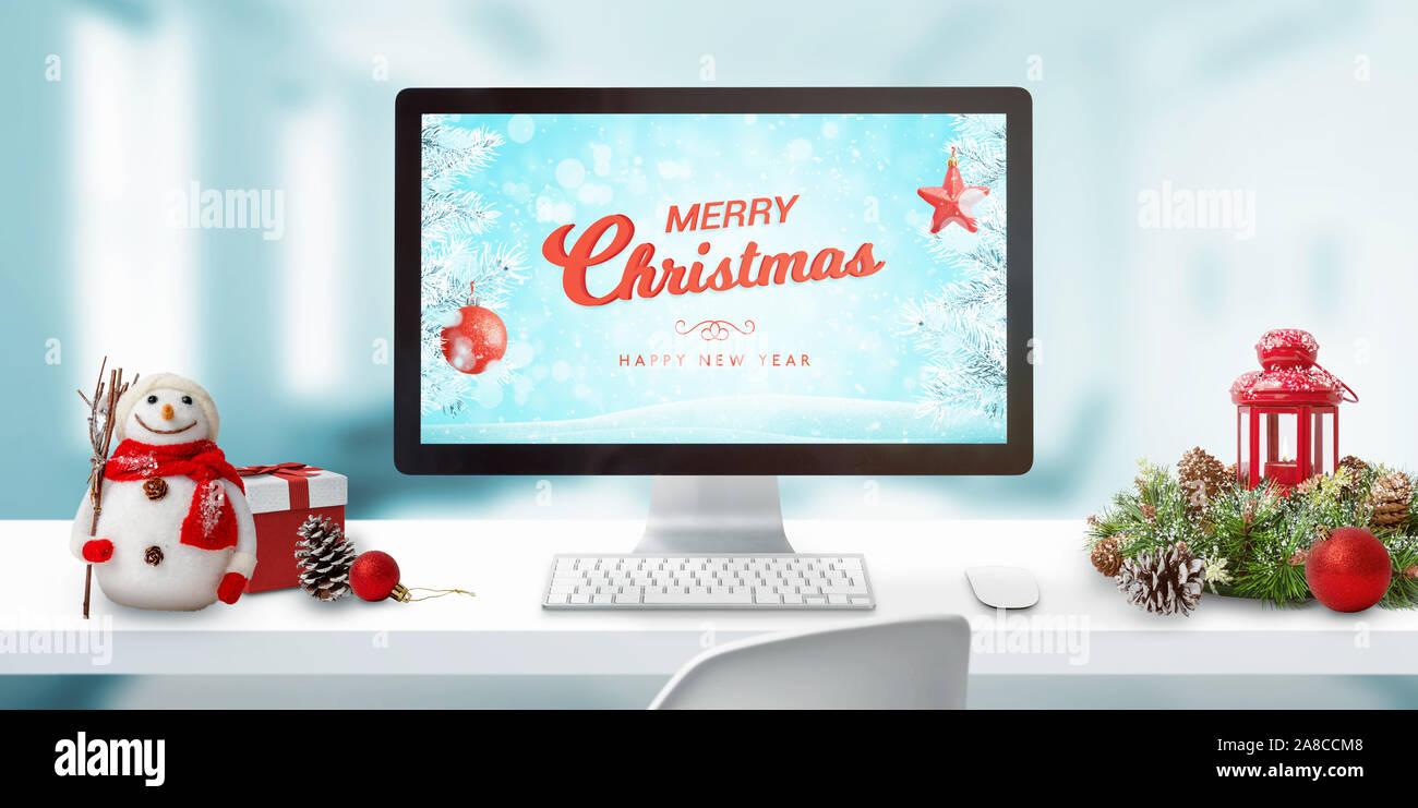 Christmas In Office Concept Merry Christmas Greeting On Computer