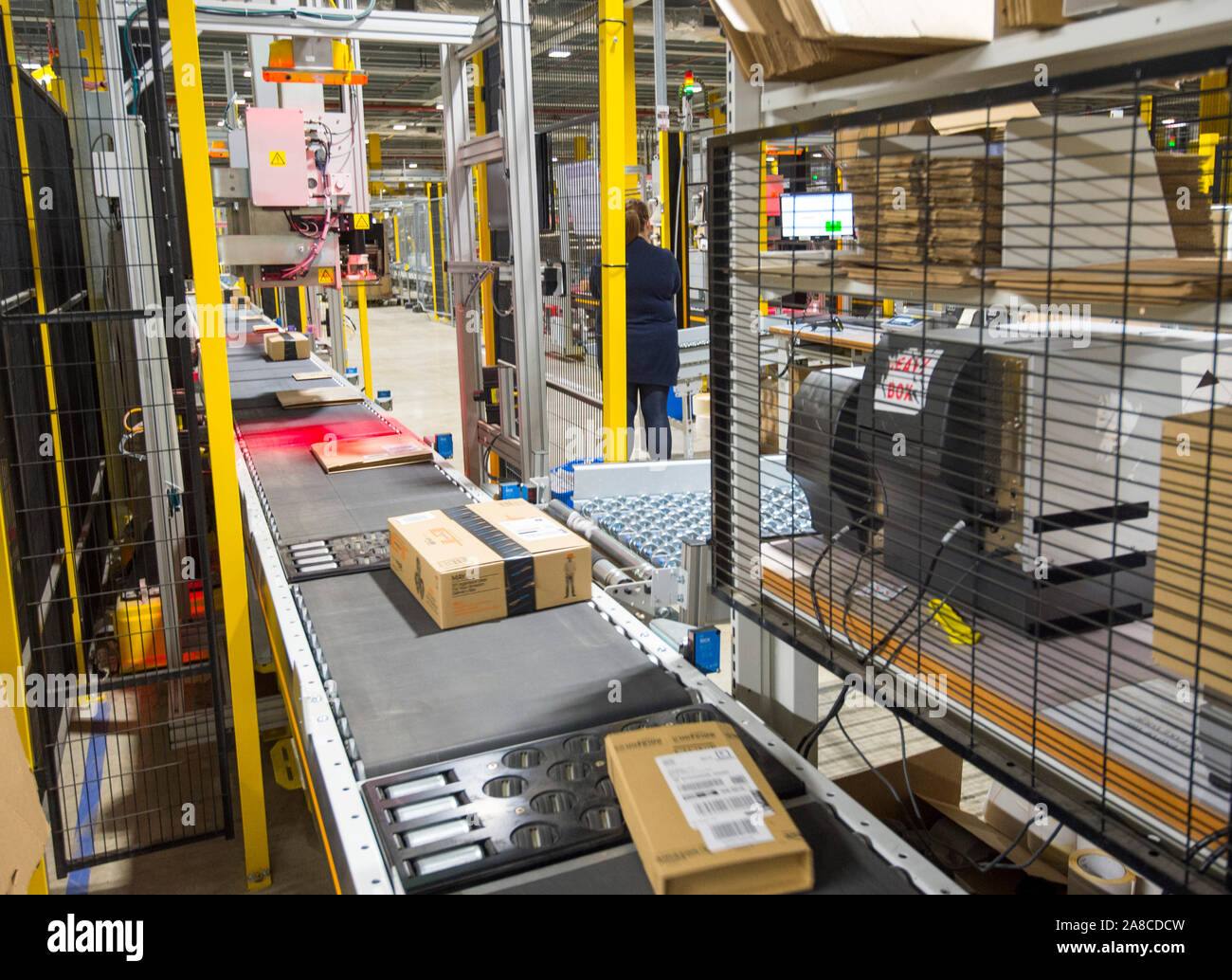 The Robotic operation of an Amazon warehouse in the Midlands of the  England. The state of the art robotics helps optimise the supply chain and  reduce human labour costs Stock Photo -