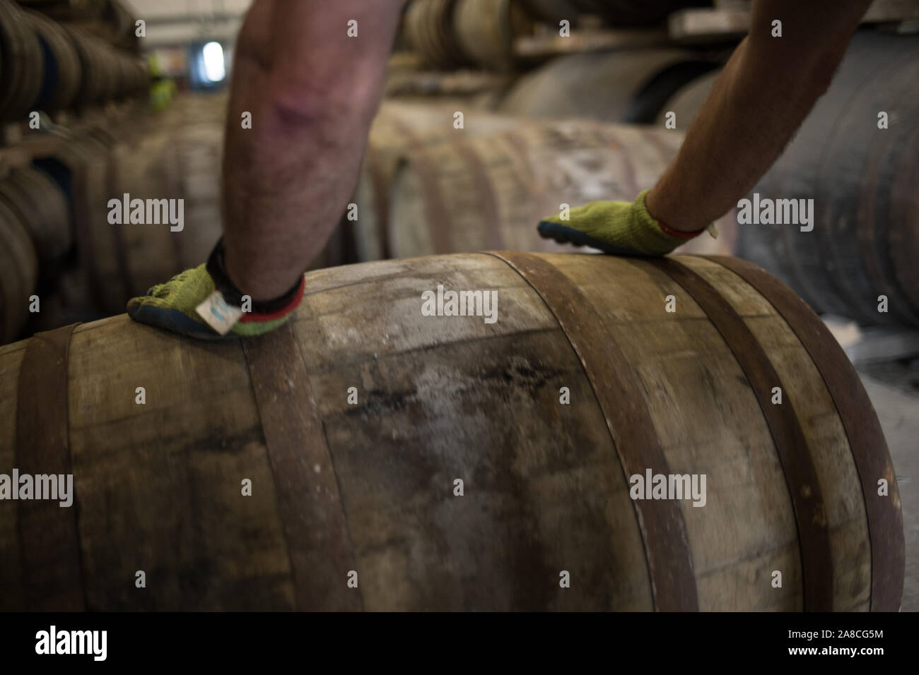 Unloading casks of Kilchoman single malt whisky into the warehouse, at Kilchoman distillery, founded in 2005 by Anthony Wills, in Islay, Scotland, 16 October 2019. Stock Photo