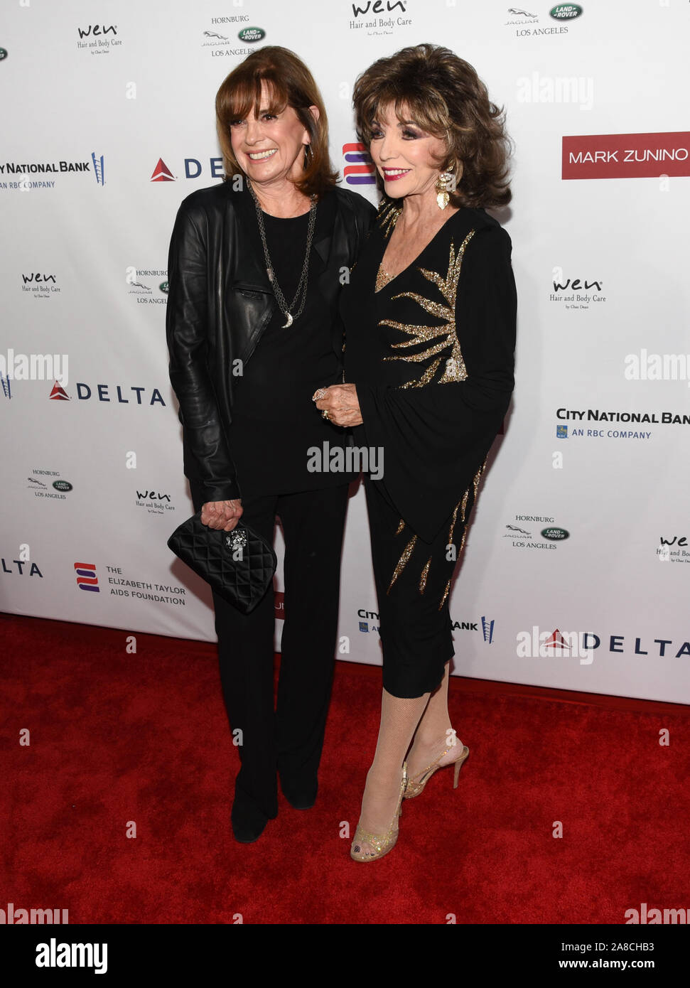 November 7, 2019, Los Angeles, California, USA: Linda Gray and Joan Collins attends Mark Zunino Atelier Fashion & Cocktail Reception to Benefit The Elizabeth Taylor AIDS Foundation. (Credit Image: © Billy Bennight/ZUMA Wire) Stock Photo