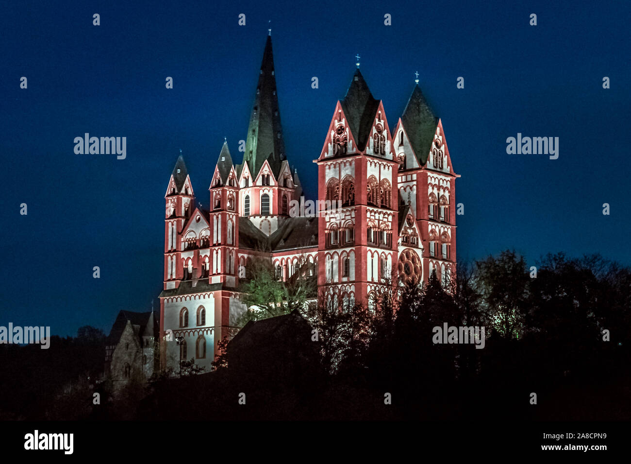 cathedral illuminated at the blue hour, Limburg an der Lahn, Germany Stock Photo