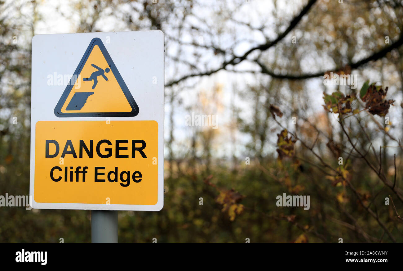 A warning sign along Berry Hill Road that backs on to the edge of the quarry wall which forced the evacuation of residents of Bank End Close, Mansfield. PA Photo. Picture date: Friday November 8, 2019. Parts of England endured a month's worth of rain in 24 hours, with scores of people rescued or forced to evacuate their homes, others stranded overnight in a shopping centre, and travel plans thrown into chaos. See PA story WEATHER Rain. Photo credit should read: Simon Cooper/PA Wire Stock Photo