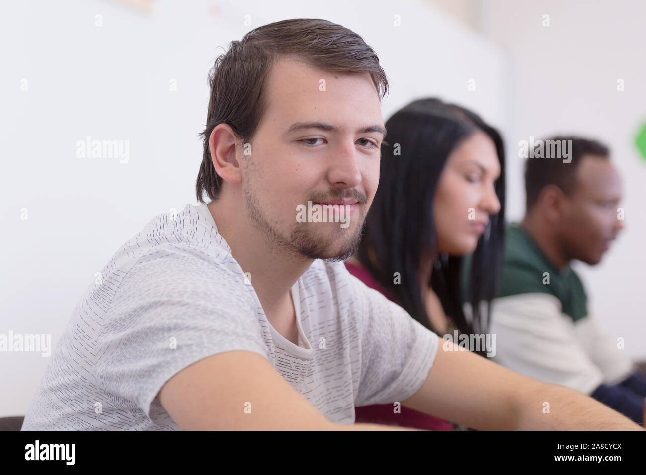 Group of students study in modern school computer lab classroom. Male ...