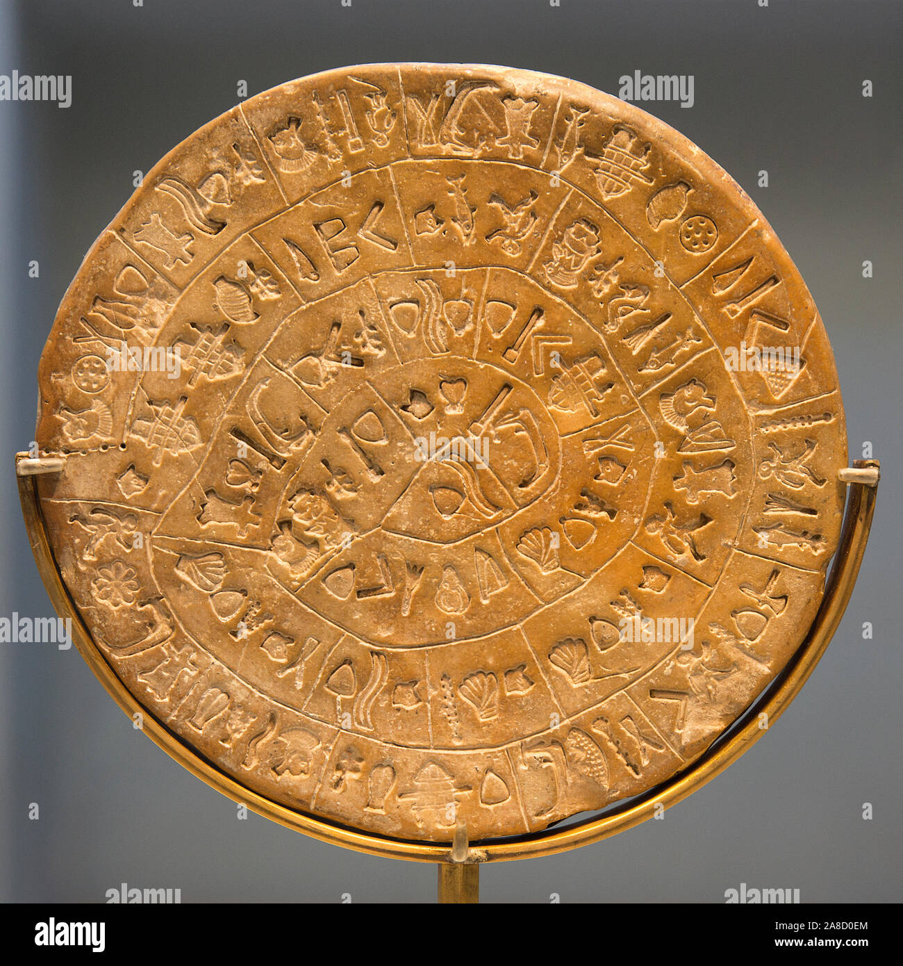 Heraklion, Crete, Greece. The celebrated Phaistos Disc on display in the Heraklion Archaeological Museum. Stock Photo